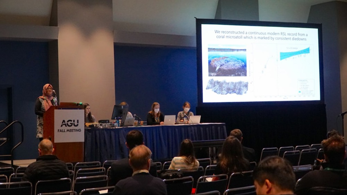 PhD student Gina Sarkawi giving her talk on corals from the Philippines at the 2022 AGU Fall Meeting