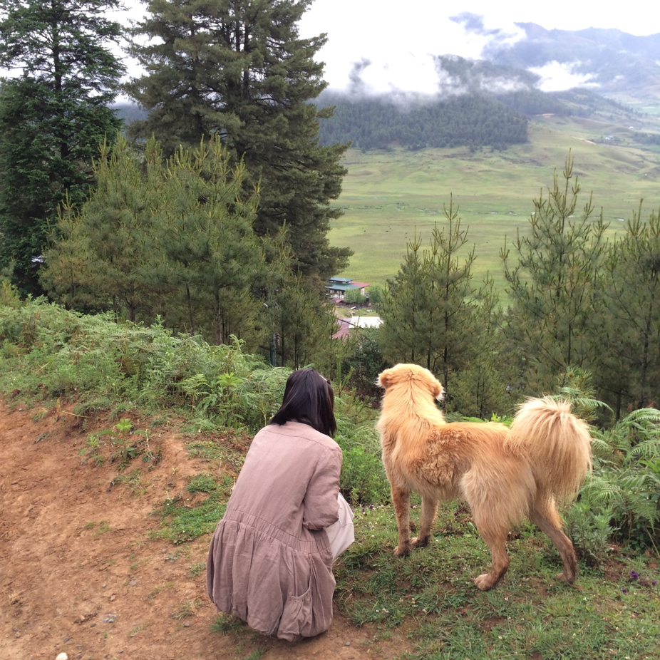 The Beginning - gazing down the Black-necked Crane Valley with a local dog (Source: Skye Lee) The Beginning - gazing down the Black-necked Crane Valley with a local dog (Source: Skye Lee)
