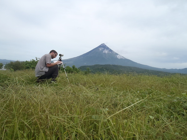 Asst. Prof Taisne conducting fieldwork at Mt Mayon in the Philippines in May 2013 (Source: Benoit Taisne)