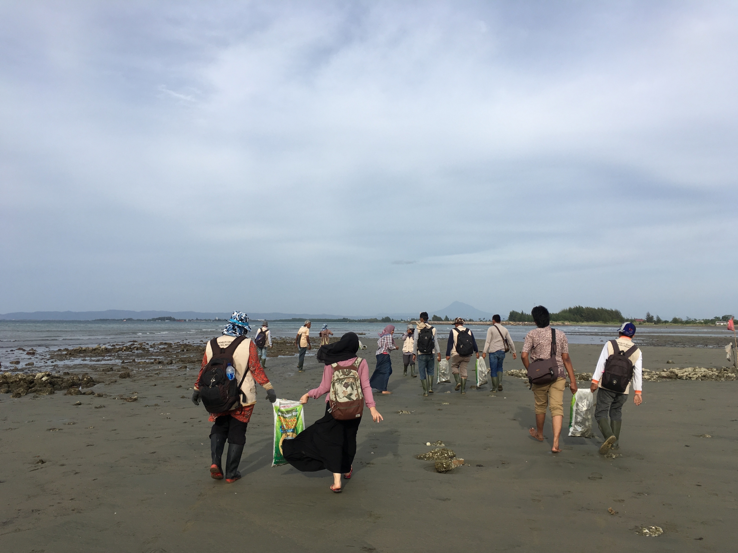 Acehnese field researchers collecting ceramic sherds on the coast of Aceh in 2017 (Source: Patrick Daly/Earth Observatory of Singapore)