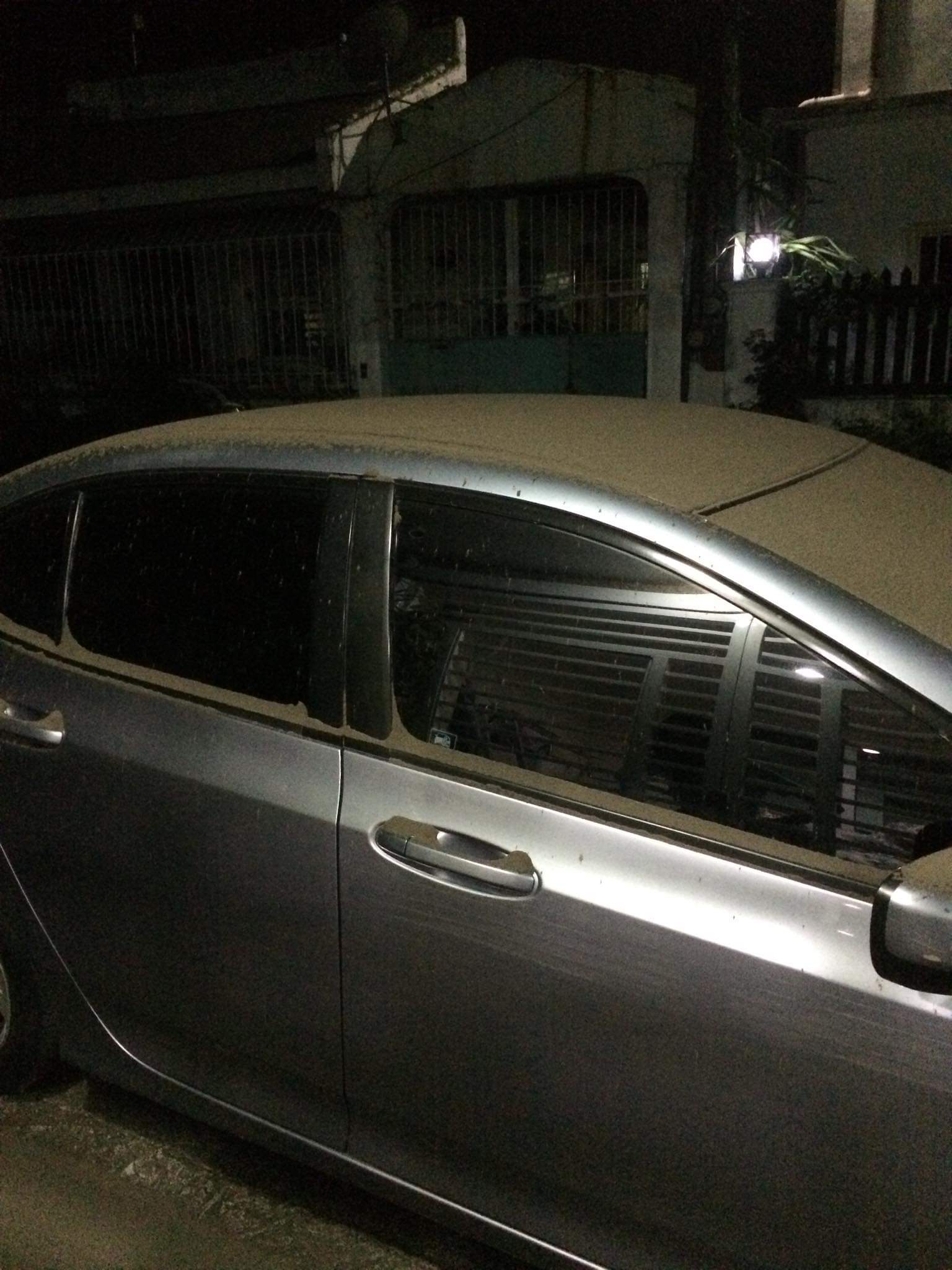 Ash fall on a car in Cavite, Philippines (Source: Rizza/Twitter) Ash fall on a car in Cavite, Philippines (Source: Rizza/Twitter)