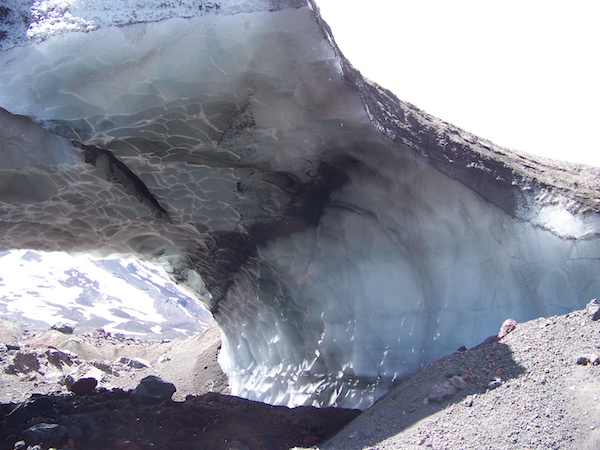 A lava flow from the 2008 eruption of the Llaima Volcano in Chile caused this glacier to melt into a tunnel of ice (Source: Patrick Whelley)