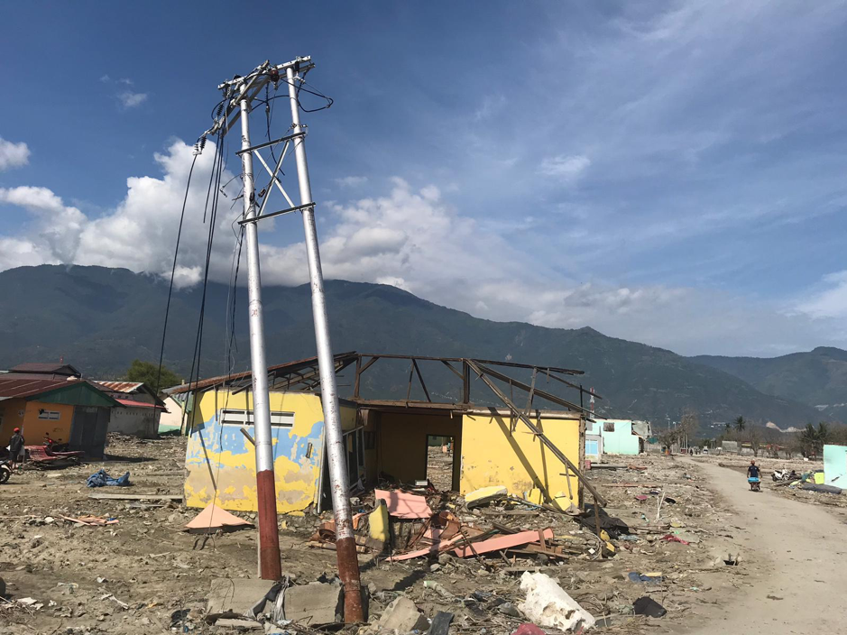Pictured here is a house in Palu, Indonesia, that was destroyed by the earthquake-tsunami event on 28 September 2018, and a newly bulldozed street (right) (Source: Adam Switzer/ Earth Observatory of Singapore)