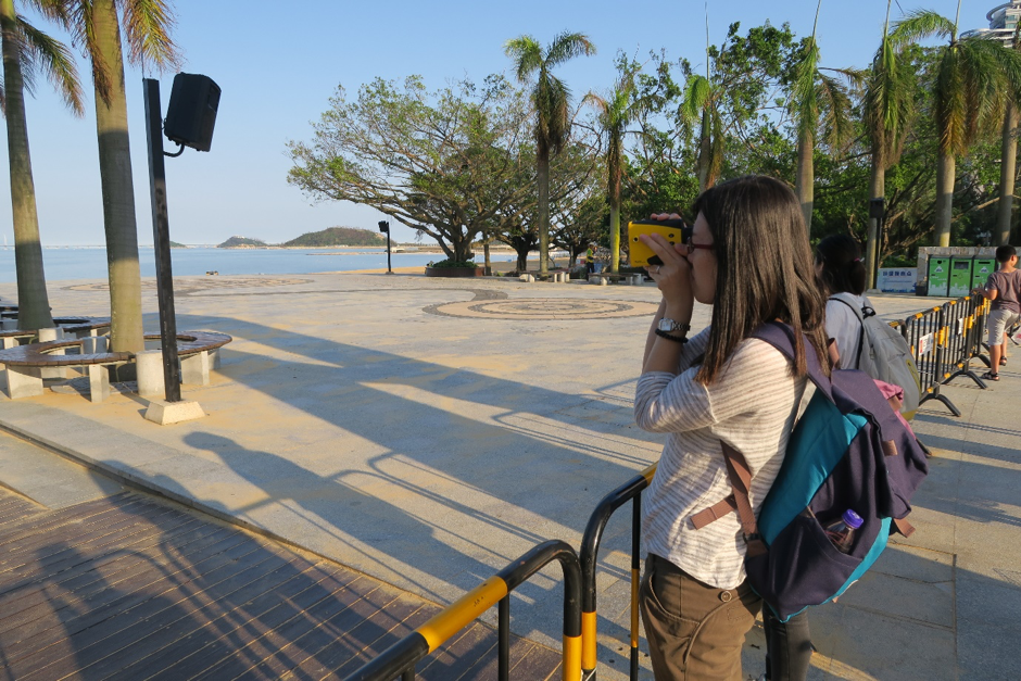 Dr Linlin Li surveys the distance of inundation in post-Hato Zhuhai (Source: Constance Chua)