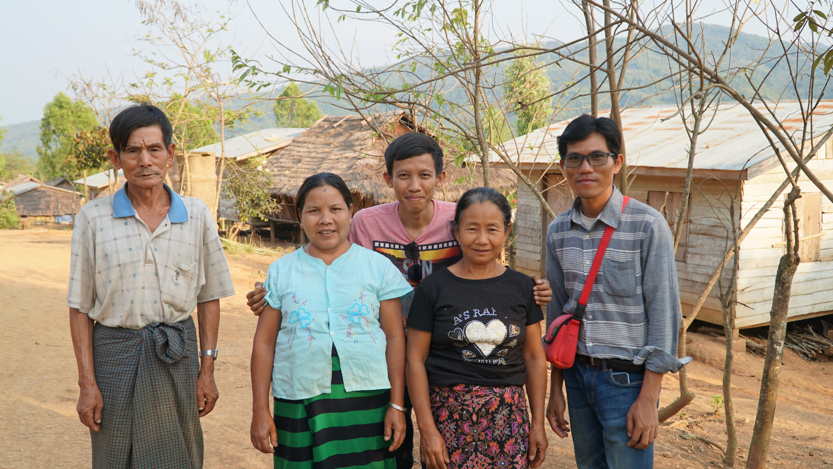 EOS Research Associate Lin Thu Aung stands with residents of a village affected by the 2011 Tarlay earthquake (Source: Yvonne Soon)
