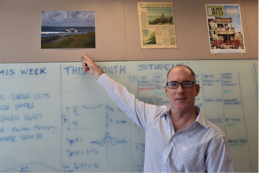 Associate Professor Switzer points out his favourite wave, known as Redsands, a breaker off the coast of New South Wales in Australia. A former surfer, Assoc Prof Switzer is now a climate scientist at the Earth Observatory of Singapore (Source: Shireen Federico)