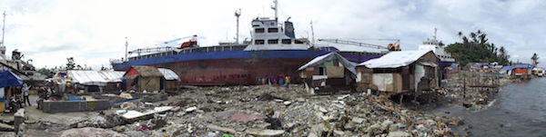 This ship was washed ashore by a devastating storm surge in Anibong village, Tacloban (Source: Hermann Fritz) This ship was washed ashore by a devastating storm surge in Anibong village, Tacloban (Source: Hermann Fritz)